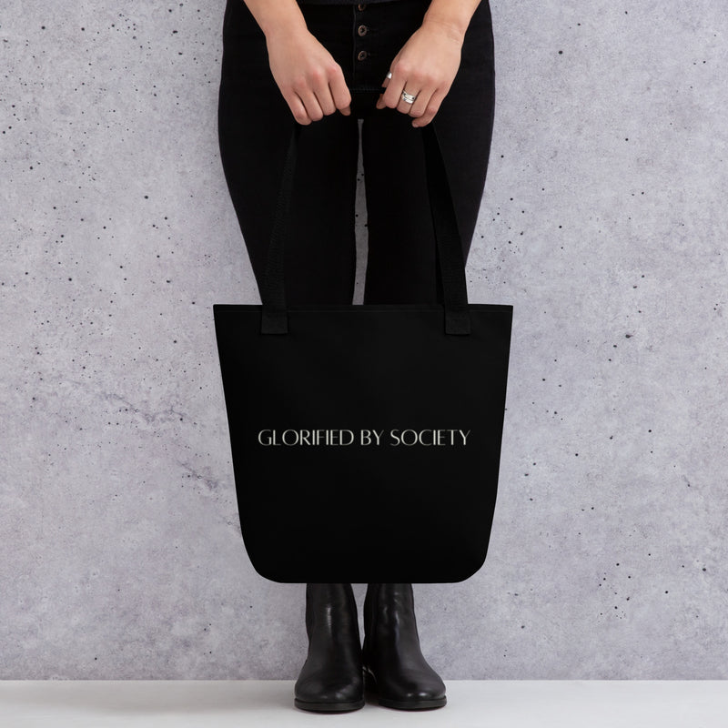 Spacious and trendy tote bag made of 100% spun polyester, with dual cotton bull denim handles and a 44
lbs weight capacity for carrying essentials.